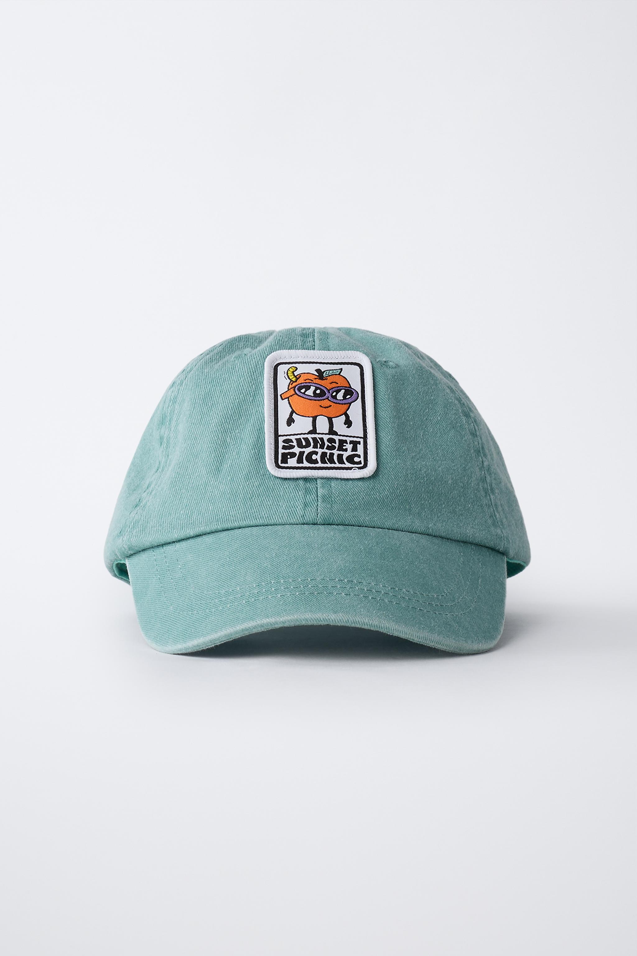 CASQUETTE EFFET DÉLAVÉ AVEC PIÈCE